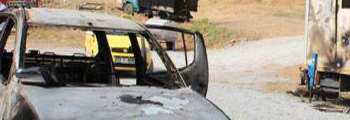 Güroymak'ta Çıkan Çatışmada Araçlar Yakıldı